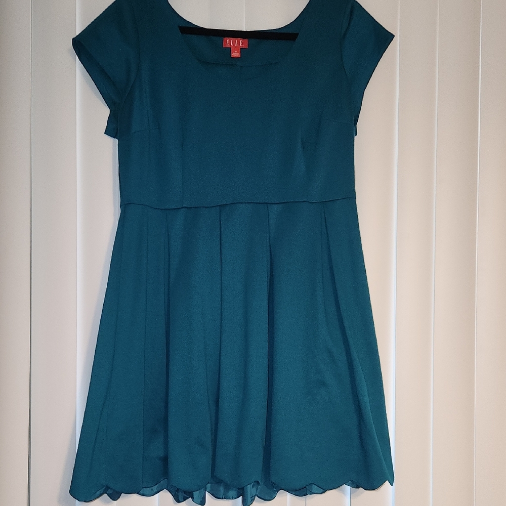 Elle Teal Dress With Scoop Neckline, scalloped hemline and Cap Sleeves. Size 16